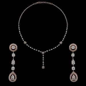 Buy 18 Karat Gold & Diamond Necklace Set