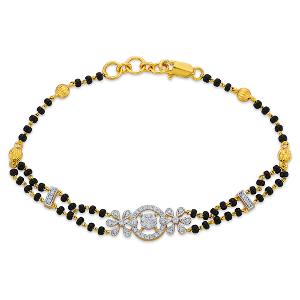 Buy 18 Karat Gold & Diamond Bracelet