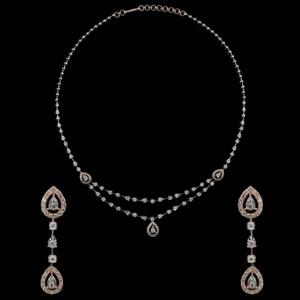 Buy 18 Karat Gold & Diamond Necklace Set