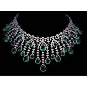 Buy 18 Karat Gold & Diamond Necklace Set
