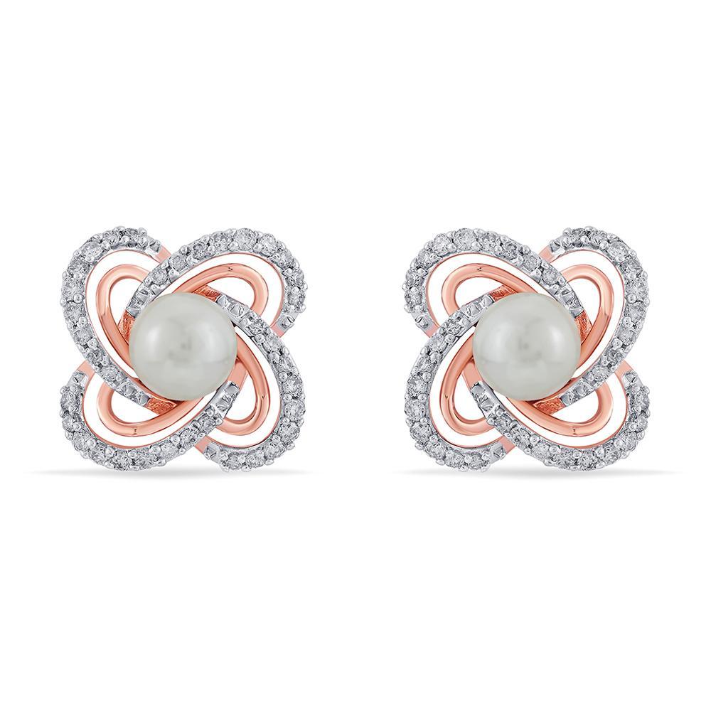 Celestial Beauty Earrings
Stud-earrings, crafted in 14KT gold and encrusted with diamonds and pearl.