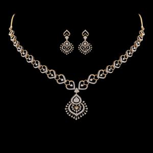 Buy 18 Karat Gold & Diamond Necklace Set