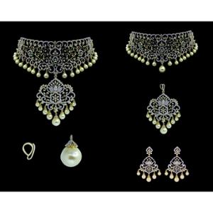 Buy 18 Karat Gold & Diamond Necklace Set