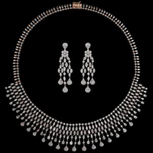 Buy 18 Karat Gold & Diamond Necklace Set